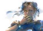  1girl apple blue_dress bracelet bun_cover china_dress chinese_clothes chun-li commentary_request double_bun dress earrings eating food frills fruit grey_eyes holding holding_food holding_fruit jewelry looking_to_the_side puffy_sleeves solo spiked_bracelet spikes street_fighter street_fighter_iv_(series) street_fighter_v upper_body yasuda_akira 