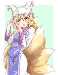  1girl absurdres blonde_hair blush commentary_request eyebrows_visible_through_hair fox_tail green_background hat highres hiro_(pqtks113) long_sleeves looking_at_viewer multiple_tails open_mouth short_hair solo tabard tail touhou white_background white_headwear yakumo_ran yellow_eyes 