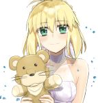  1girl absurdres ahoge artoria_pendragon_(all) bangs bare_shoulders blonde_hair blush braid breasts collarbone commentary_request dress eyebrows_visible_through_hair fate/stay_night fate_(series) green_eyes hair_ribbon highres holding looking_at_viewer medium_breasts ribbon saber seijun-pb simple_background smile solo stuffed_animal stuffed_lion stuffed_toy white_background white_dress white_ribbon 