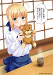  1girl :i ahoge arms_up artoria_pendragon_(all) bangs blonde_hair blue_neckwear blue_skirt blush braid commentary_request cup eyebrows_visible_through_hair fate/stay_night fate_(series) french_braid green_eyes highres holding holding_stuffed_animal long_sleeves looking_at_viewer omochikaeriya pout saber shirt sitting skirt sliding_doors solo steam stuffed_animal stuffed_lion stuffed_toy table tea translation_request twitter_username white_shirt wooden_floor 