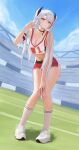 1girl absurdres antenna_hair arm_strap azur_lane black_choker breasts choker cleavage crop_top dolphin_shorts full_body grey_hair hand_in_own_hair hand_on_own_knee hand_up highres knees_together_feet_apart kong_zhizen leaning_forward long_hair looking_at_viewer midriff multicolored_hair navel number_print official_alternate_costume pigeon-toed prinz_eugen_(azur_lane) prinz_eugen_(brilliant_touchdown)_(azur_lane) red_hair red_shorts shoes short_shorts shorts sky smile socks solo stadium standing streaked_hair two_side_up white_sneakers white_socks 