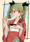  anchovy_(girls_und_panzer) bangs barashiya black_border black_ribbon border closed_mouth commentary drill_hair eating eyebrows_visible_through_hair floral_print food girls_und_panzer green_hair hair_ribbon highres holding holding_food holding_plate japanese_clothes kimono long_hair long_sleeves looking_at_viewer mochi obi outside_border plate print_kimono red_eyes red_kimono ribbon sash smile standing twin_drills twintails wide_sleeves 