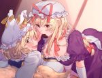 2girls :d bangs blonde_hair blush bow breasts brown_eyes candy chocolate chocolate_heart choker cleavage commentary_request dress elbow_gloves eyebrows_visible_through_hair food food_in_mouth fox_tail frills gloves hair_between_eyes hair_bow hat hat_ribbon heart highres indoors large_breasts long_hair looking_at_another looking_at_viewer looking_back lying masanaga_(tsukasa) mob_cap mouth_hold multiple_girls multiple_tails on_back open_mouth pillow_hat profile puffy_short_sleeves puffy_sleeves purple_dress purple_eyes red_bow red_choker red_ribbon ribbon ribbon_choker short_hair short_sleeves smile sweat tabard tail touhou white_dress white_gloves white_headwear yakumo_ran yakumo_yukari yuri 
