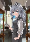 1girl :d animal_ear_fluff animal_ears barista black_vest blue_eyes blush buttons coffee collared_shirt commentary_request cowboy_shot dress_shirt fang fox_ears fox_girl fox_tail from_side grey_hair grey_skirt grey_vest hand_on_own_hip highres holding_coffee_pot indoors kamiyoshi_rika light_blush long_hair looking_at_viewer open_mouth original ponytail shirt skirt smile solo standing tail vest white_shirt wing_collar 