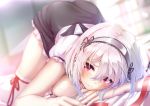  1girl azur_lane bangs blurry blurry_background blush breasts collarbone dress hair_between_eyes imo_bouya indoors lace-trimmed_hairband large_breasts looking_at_viewer on_bed puffy_sleeves red_eyes short_hair short_sleeves sirius_(azur_lane) solo thighhighs thighs top-down_bottom-up white_hair white_legwear 