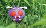  creature day fangs full_body gen_1_pokemon grass looking_at_viewer morii_yuka nature no_humans official_art outdoors photo pokemon pokemon_(creature) pokemon_trading_card_game red_eyes solo standing third-party_source venonat 