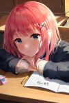  1girl absurdres blazer blue_eyes blush closed_mouth desk eyebrows_visible_through_hair hair_ornament hairclip head_rest highres jacket kimae long_sleeves looking_at_viewer original pink_hair school_desk school_uniform smile solo upper_body x_hair_ornament 