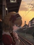  1girl asagi_noko blonde_hair bow bowtie cloud collar commentary_request dusk expressionless frilled_collar frilled_hairband frills green_eyes hair_bow hairband hand_on_own_chest highres idolmaster idolmaster_cinderella_girls lolita_hairband long_sleeves outdoors overhead_line profile railroad_tracks red_bow red_neckwear sakurai_momoka scenery short_hair sign sky solo telephone_pole train_station train_station_platform tree twilight upper_body wavy_hair 