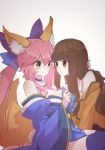  2girls animal_ear_fluff animal_ears bare_shoulders blue_kimono blue_legwear breasts brown_eyes brown_hair cleavage commentary commentary_request detached_sleeves fate/extra fate_(series) fox_ears fox_girl fox_tail japanese_clothes kimono kishinami_hakuno_(female) large_breasts long_hair looking_at_another multiple_girls nejikyuu pink_hair school_uniform tail tamamo_(fate)_(all) tamamo_no_mae_(fate) tsukumihara_academy_uniform_(fate/extra) yellow_eyes 