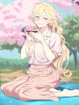  1girl alternate_costume bangs barefoot blonde_hair blue_eyes blush breasts cherry_blossoms collared_shirt cup day grin hair_between_eyes highres holding holding_cup jewelry kantai_collection lips long_hair mole mole_under_eye mole_under_mouth outdoors petals pink_skirt richelieu_(kantai_collection) ring sakazuki shingyo shirt short_sleeves sitting skirt smile solo 