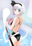  1girl absurdres bangs blunt_bangs blurry bob_cut box commentary_request competition_swimsuit cowboy_shot depth_of_field from_behind ghost green_eyes heart highres hitodama jack_(wkm74959) konpaku_youmu konpaku_youmu_(ghost) looking_at_viewer one-piece_swimsuit short_hair silver_hair solo standing swimsuit sword touhou two-tone_swimsuit weapon 