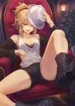  1girl bangs bare_shoulders black_camisole black_footwear black_jacket black_shorts blonde_hair boots braid breasts chair cleavage collarbone contemporary fate/apocrypha fate/grand_order fate_(series) fedora french_braid green_eyes groin_tendon hair_ornament hair_scrunchie hat highres jacket layered_clothing legs long_hair looking_at_viewer mashuu_(neko_no_oyashiro) medium_breasts mordred_(fate) mordred_(fate)_(all) open_clothes open_jacket open_mouth parted_bangs plant ponytail potted_plant red_scrunchie scrunchie short_shorts shorts sidelocks sitting solo white_headwear white_tank_top 