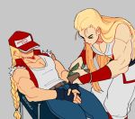  2boys andy_bogard armband artist_name blonde_hair braided_ponytail covered_eyes denim fatal_fury fatal_fury_cap fingerless_gloves gloves jacket jeans long_hair multiple_boys pants regiusfurca sleeveless terry_bogard theft 