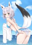  1girl absurdres ahoge animal_ears back bangs bare_arms bare_shoulders bikini bikini_skirt blue_bikini blue_sky blush braid breasts commentary_request day eyebrows_visible_through_hair fox_ears fox_girl fox_tail from_behind highres holding_shirt hololive horizon leaning_forward long_hair looking_at_viewer looking_back medium_breasts multiple_braids nemun_(tamizzz) ocean outdoors shirakami_fubuki shirt_removed short_hair sideboob silver_hair sky solo swimsuit tail very_long_hair wading water 