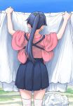  1girl blue_hakama clothesline day drying drying_clothes from_behind hair_ribbon hakama hakama_skirt highres houshou_(kantai_collection) japanese_clothes kantai_collection laundry laundry_basket laundry_pole long_hair outdoors ponytail ribbon sky solo thighhighs vent_arbre white_legwear 