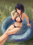  1girl bikini breasts cleavage closed_eyes eyepatch facing_viewer feet_out_of_frame grass halterneck hand_up highres kantai_collection large_breasts navel no_headgear noccu one_eye_covered outdoors purple_bikini purple_hair sharp_teeth short_hair sitting smile solo swimsuit teeth tenryuu_(kantai_collection) wading_pool water 