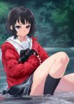  1girl bird black_hair black_legwear blue_eyes blurry blurry_background crow deca_purio forest highres holding_bird jacket looking_at_viewer nature original red_jacket school_uniform short_hair skirt socks water water_drop wet wet_clothes wet_skirt 