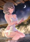  1girl alcohol arm_under_breasts bangs bare_arms bare_legs bare_shoulders blue_eyes blush breasts bush cleavage collarbone crescent cup fence green_eyes heterochromia highres idolmaster idolmaster_cinderella_girls light_brown_hair medium_breasts mizuki_makoto mole mole_under_eye moon naked_towel night night_sky onsen parted_lips sake short_hair sky smile solo steam takagaki_kaede towel water wet 