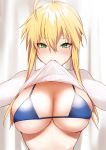  1girl ahoge artoria_pendragon_(all) artoria_pendragon_(lancer) bangs bikini blonde_hair blue_bikini blush braid breasts cleavage closed_mouth clothes_lift fate/grand_order fate_(series) french_braid green_eyes hair_between_eyes highres iriehana large_breasts long_hair long_sleeves looking_at_viewer mouth_hold ribbed_sweater sidelocks sweater sweater_lift swimsuit white_sweater 