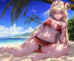  1girl akai_haato akasaai bare_shoulders barefoot beach bikini bikini_skirt blonde_hair blue_eyes blue_sky breasts breasts_apart cloud day hair_bun halter_top halterneck hololive large_breasts long_hair looking_at_viewer navel ocean outdoors palm_tree red_bikini sky smile solo stomach strap_gap swimsuit thighs tree tree_shade very_long_hair virtual_youtuber water 