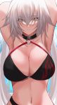  1girl absurdres armpits arms_up bangs bikini black_bikini breasts cleavage closed_mouth eyebrows_visible_through_hair eyes_visible_through_hair fate/grand_order fate_(series) hair_over_eyes highres jeanne_d&#039;arc_(alter_swimsuit_berserker) jeanne_d&#039;arc_(fate)_(all) large_breasts long_hair looking_at_viewer navel o-ring o-ring_bikini silver_hair solo stomach swimsuit upper_body very_long_hair yellow_eyes yuki_maccha_(yukimattya10) 