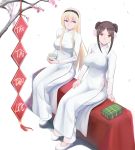  2girls absurdres black_hair blonde_hair cup dress flower hair_flower hair_ornament highres irisdina_bernhard multiple_girls muvluv nguyen_tam_lee pham_thi_ran schwarzesmarken sitting tea tree vietnamese_dress vietnamese_new_year vietnamese_text white_dress 