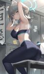  1girl absurdres arms_up ass black_sports_bra blue_archive breasts feet_out_of_frame grey_hair halo highres indoors jixo_(user_nzhc8728) large_breasts locker locker_room looking_at_viewer looking_to_the_side pants shiroko_(blue_archive) sitting solo sports_bra steaming_body sweat yoga_pants 