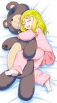  1girl :d barefoot bed_sheet blonde_hair character_request closed_eyes commentary_request copyright_request highres holding holding_stuffed_toy long_sleeves lying medium_hair on_side open_mouth pajamas pink_pajamas sleeping smile solo stuffed_animal stuffed_toy teddy_bear teruki_kuma toes 