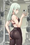 1girl ass bang_dream! bang_dream!_it&#039;s_mygo!!!!! bare_arms black_leggings black_sports_bra cellphone chinese_commentary closed_mouth commentary_request cowboy_shot da_akana_xiv expressionless from_behind green_hair gym highres holding holding_phone leggings long_hair looking_at_viewer phone selfie smartphone solo sports_bra taking_picture twitter_username wakaba_mutsumi yellow_eyes 