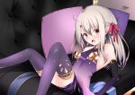  1girl armlet armor bare_shoulders bikini_armor blush breasts collar cosplay couch cushion detached_sleeves dress earrings fate/grand_order fate/kaleid_liner_prisma_illya fate_(series) hair_ribbon highres illyasviel_von_einzbern jewelry kama_(fate) kama_(fate)_(cosplay) kama_(first_ascension)_(fate) long_hair looking_at_viewer lying metal_collar miniskirt on_back open_mouth pei_iriya purple_dress purple_skirt purple_sleeves purple_thighhighs red_eyes ribbon sidelocks skirt small_breasts solo thighhighs thighlet white_hair 