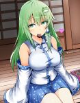  1girl blue_skirt blush breasts candy chocolate commentary_request detached_sleeves food frog_hair_ornament green_eyes green_hair hair_ornament heart heart-shaped_chocolate highres kochiya_sanae kyanta5354 large_breasts looking_at_viewer mouth_hold on_floor shirt sitting skirt sleeveless sleeveless_shirt snake_hair_ornament solo touhou 