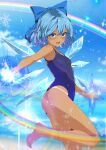  1girl beach blue_bow blue_eyes blue_hair blue_sky bow cirno detached_wings fairy hair_bow highres ice ice_wings kitaura_kasumi leg_up lens_flare looking_at_viewer rainbow sky smile snowflakes solo swimsuit tan tanlines touhou v-shaped_eyebrows water_drop wings 