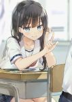  1girl black_hair blue_eyes desk eyebrows_visible_through_hair highres index_finger_raised long_hair original school_desk school_uniform skirt smile solo yushima 