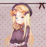  1girl abigail_williams_(fate/grand_order) bangs black_bow black_dress black_headwear blonde_hair blue_eyes blush bow breasts canary999 closed_mouth dress fate/grand_order fate_(series) forehead hair_bow hat highres holding holding_stuffed_animal long_hair looking_at_viewer multiple_bows orange_bow parted_bangs polka_dot polka_dot_background polka_dot_bow ribbed_dress sleeves_past_fingers sleeves_past_wrists small_breasts smile stuffed_animal stuffed_toy teddy_bear 