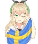 1girl absurdres aceofbros blush brown_hair collared_shirt eyebrows_visible_through_hair flag green_eyes highres holding holding_flag horns long_hair looking_at_viewer messy_hair one_eye_closed original parted_lips shirt short_sleeves smile solo swedish_flag upper_body upper_teeth v_over_eye wavy_hair white_shirt 