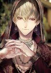  1boy bead_necklace beads blonde_hair blurry blurry_background closed_mouth earrings embroidery eyelashes fate/grand_order fate_(series) fingernails gem gilgamesh glint hair_between_eyes highres jewelry light_particles long_sleeves looking_at_viewer making-of_available male_focus necklace own_hands_together red_eyes ring sakura_hitsuji slit_pupils smile solo upper_body veil 