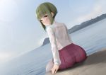  back brown_eyes green_hair kantai_collection lens_flare looking_at_viewer looking_back ne_an_ito ocean scenery shirt short_hair sitting skirt smile takanami_(kantai_collection) white_shirt 