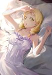  1girl :o arm_up bare_arms bare_shoulders bed bed_sheet blonde_hair blush bow braid breasts cleavage collarbone commentary_request dated green_eyes hair_ornament hair_scrunchie long_hair looking_at_viewer love_live! love_live!_sunshine!! lying medium_breasts nightgown ohara_mari on_back parted_lips pillow purple_bow scrunchie shamakho signature solo twin_braids 