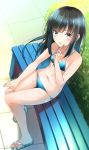  1girl alternate_costume asashio_(kantai_collection) bangs bare_arms bare_legs bare_shoulders bench bikini black_hair blue_bikini blue_eyes blush breasts comah commentary_request eyebrows_visible_through_hair highres kantai_collection long_hair looking_at_viewer navel open_mouth outdoors popsicle_stick sandals side-tie_bikini sitting small_breasts smile solo string_bikini striped striped_bikini swimsuit 