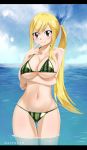  1girl absurdres artist_name bikini blonde_hair blush breasts brown_eyes cleavage cloud collarbone cowboy_shot day eyebrows_visible_through_hair eyes_visible_through_hair fairy_tail food_print gaston18 hair_between_eyes highres in_water large_breasts long_hair lucy_heartfilia navel outdoors side_ponytail sky smile solo standing stomach swimsuit water watermark watermelon_print wet 