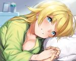  1girl 92m ahoge bangs blonde_hair blue_eyes blush breasts cleavage green_shirt hachimiya_meguru highres holding_hands idolmaster idolmaster_shiny_colors large_breasts long_hair long_sleeves looking_at_viewer lying on_side pajamas photoshop_(medium) pillow shirt smile solo_focus swept_bangs 