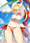 1girl aestus_estus ahoge arms_up bangs bare_shoulders bikini blonde_hair blue_sky blueorca blush breasts cleavage collarbone criss-cross_halter dress earrings fate/grand_order fate_(series) gown green_eyes hair_between_eyes hair_intakes halterneck highres jewelry large_breasts long_hair looking_at_viewer navel nero_claudius_(fate)_(all) nero_claudius_(swimsuit_caster)_(fate) palm_tree red_bikini side-tie_bikini sky smile striped striped_bikini swimsuit sword thighs tree twintails weapon 