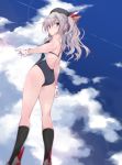  1girl black_legwear blue_eyes blue_sky cloud competition_swimsuit from_behind from_below gloves grey_eyes kantai_collection kashima_(kantai_collection) kneehighs looking_at_viewer looking_back one-piece_swimsuit rudder_footwear silver_hair sky smokestack solo standing swimsuit twintails wavy_hair white_gloves yumesato_makura 