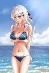  1girl absurdres arm_under_breasts barrette bikini blue_bikini blush breasts cleavage collarbone girls_frontline hair_ribbon highres iws-2000_(girls_frontline) long_hair looking_down medium_breasts navel ocean_bottom red_eyes ribbon silver_hair simple_background skyblue solo stomach swimsuit white_hair 