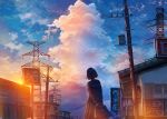  1girl air_conditioner balcony black_hair building city cloud cumulonimbus_cloud door evening from_behind highres kenzo_093 long_sleeves original outdoors power_lines power_pole railing sailor_collar scenery school_briefcase school_uniform sign sky solo sun sunset window 