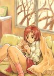  1girl blanket brown_hair commentary cup legs long_sleeves original picture_frame pink_legwear red_skirt saitani_umetarou short_hair sitting skirt smile solo sweater white_sweater 