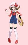  1girl bag blue_overalls blush brown_eyes brown_hair clenched_teeth collarbone commentary full_body hat highres holding holding_poke_ball kotone_(pokemon) long_hair looking_at_viewer overalls poke_ball poke_ball_(basic) pokemon pokemon_(game) pokemon_hgss red_footwear shoes smile solo teeth thighhighs tsukishiro_saika twintails white_headwear white_legwear 