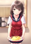  1girl apron bangs black_sailor_collar black_skirt blurry blurry_background breasts brown_eyes brown_hair cherry_tomato cleavage closed_mouth collarbone commentary_request depth_of_field eyebrows_visible_through_hair food heart highres holding holding_plate indoors looking_at_viewer medium_breasts omurice original plate pleated_skirt red_apron sailor_collar school_uniform serafuku shirt short_sleeves skirt smile solo standing tomato white_shirt yukimaru217 