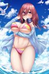  1girl bikini bird blue_eyes blue_jacket blue_sky breasts brown_hair cloud commentary_request cowboy_shot day fou_zi go-toubun_no_hanayome hair_between_eyes headphones headphones_around_neck jacket large_breasts long_hair multicolored multicolored_bikini multicolored_clothes nakano_miku ocean open_clothes open_jacket outdoors seagull side-tie_bikini sky soaking_feet solo standing swimsuit water 