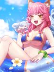  1girl animal_ear_fluff animal_ears bikini blue_bikini blue_sky breasts cleavage eyebrows_visible_through_hair fang fate/grand_order fate_(series) flower fox_ears fox_girl highres innertube large_breasts looking_at_viewer ocean open_mouth outdoors pink_hair side-tie_bikini sky solo soramame_pikuto swimsuit tamamo_(fate)_(all) tamamo_no_mae_(swimsuit_lancer)_(fate) yellow_eyes 